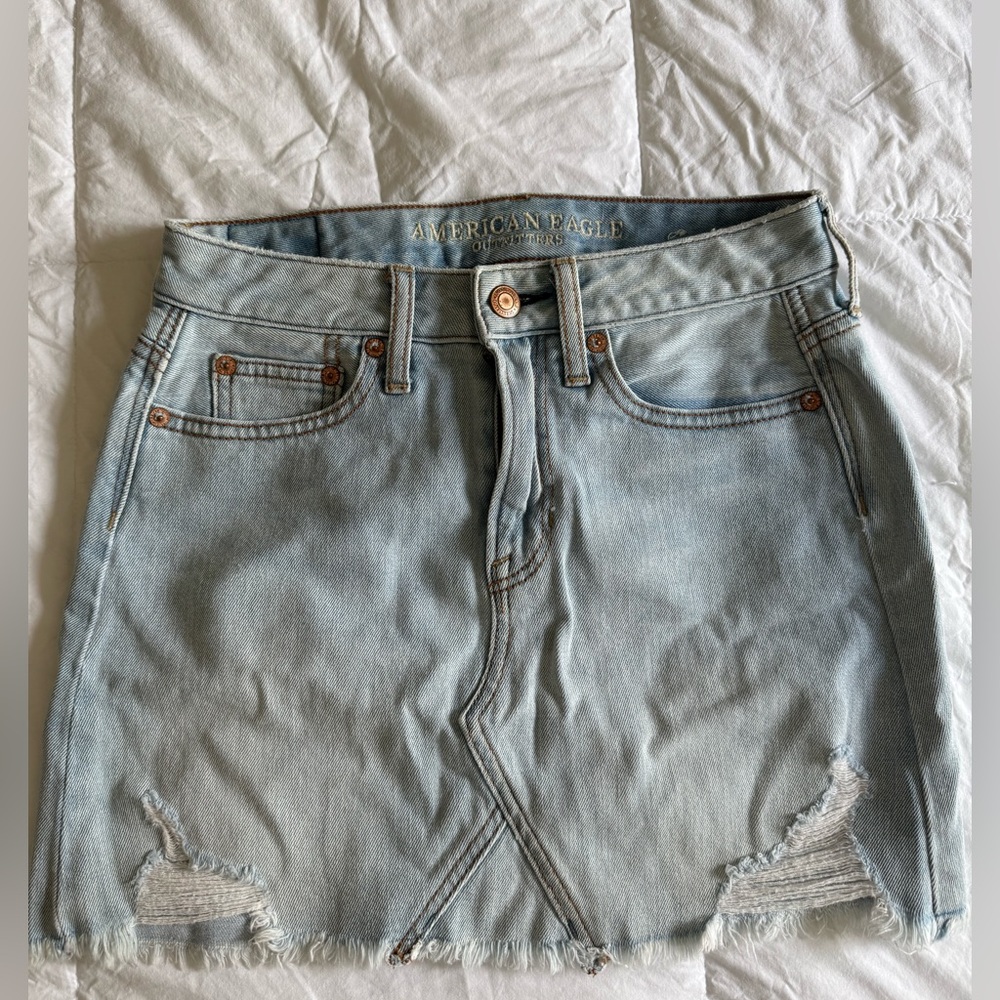 American Eagle light blue distressed denim skirt